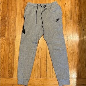 Nike Tech Heather Gray Sweatpants joggers with Black Swoosh. Like new. Size S